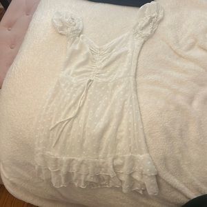 Princess Polly white mini dress .